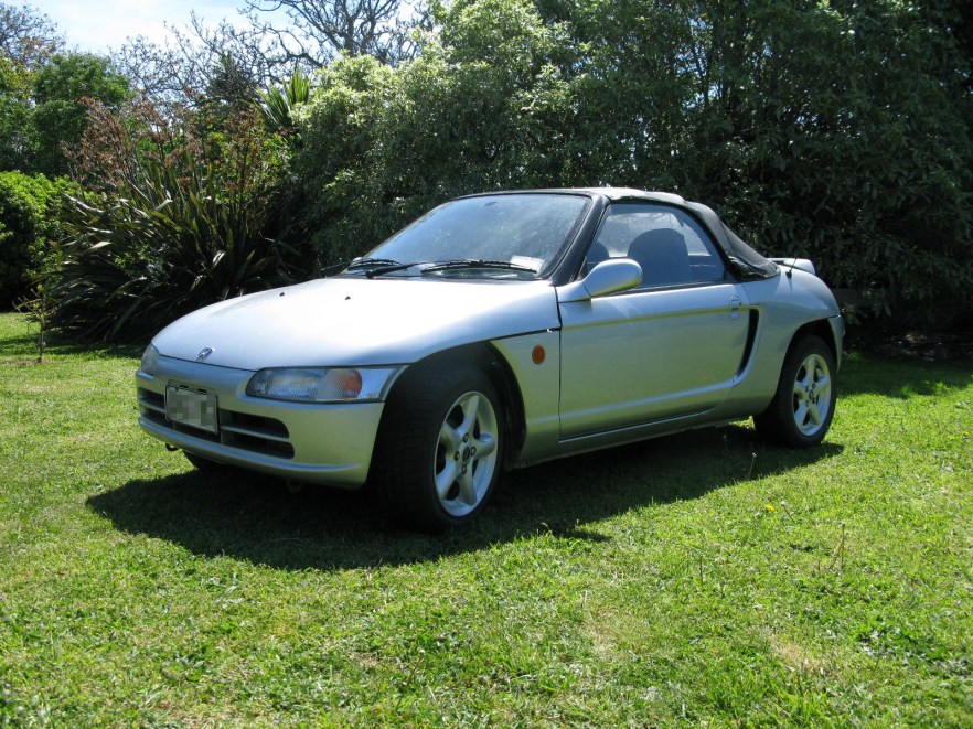 Beat on the grass with hood up.